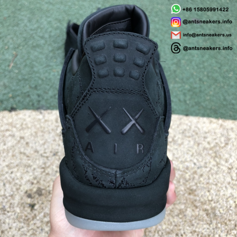 KAWS x Air Jordan 4 Retro 'Black' 930155-001