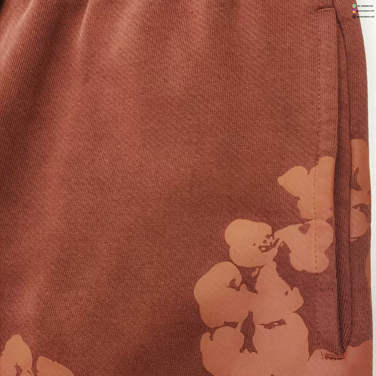 DENIM TEARS Mainline Floral Mono Brown Sweatpants