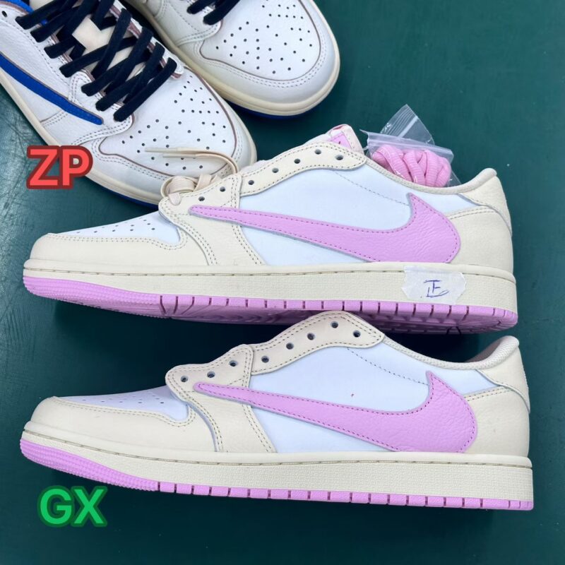 Travis Scott 1s Shy Pink GX Batch vs ZP Batch Reverse Swoosh Comparison Lateral Side View – Reverse Swoosh, Midsole, and Outsole